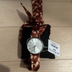 コーチ　腕時計　未使用品　
スカーフラップの画像