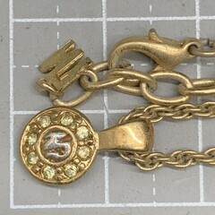 I354ニナリッチ ゴールド カラーネックレス　ロゴネックレス　NINARICCI NINA NINA RICCI　ラインストーン　サークルモチーフの画像