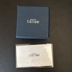 TSUTSUMI Pt ブラックダイヤピアスの画像