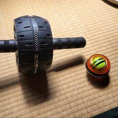 腹筋コロコロと握力強化グッズの画像