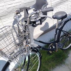 チャイルドシート付き自転車の画像