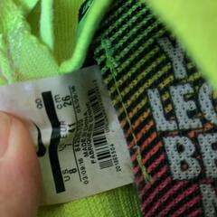 Nike 蛍光イエロー ランニングシューズの画像