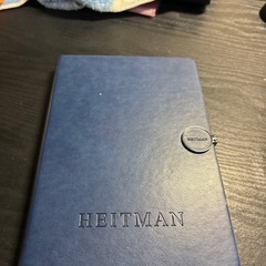 不動産投資顧問会社である「Heitman（ハイトマン）」のロゴが入ったノートの画像