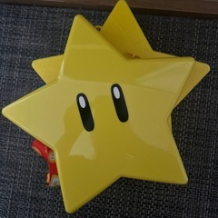 ユニバ スターと空き缶の画像