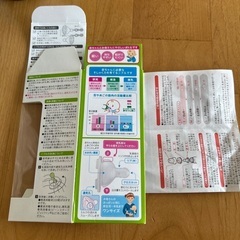 哺乳瓶2本とレンジ消毒器の画像