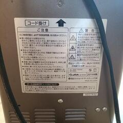 扇風機、電熱ヒーター、昭和レトロ壁掛け時計の画像