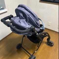 コンビ A型ベビーカーレインカバー付きの画像