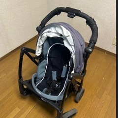 コンビ A型ベビーカーレインカバー付きの画像