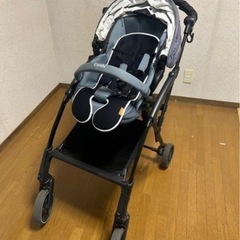 コンビ A型ベビーカーレインカバー付きの画像