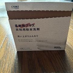 カーテンレースのみ(新品)と粉洗剤(少し使用済み)の画像