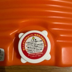 立つ湯たんぽの画像