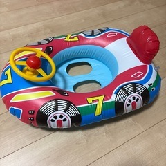 子供用　浮き輪　足入れの画像