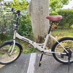 折りたたみ自転車（鍵・ライト付き）の画像