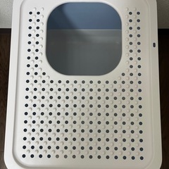 猫用トイレ 青と白の通気性デザインの画像