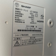 テレビ、録画機、リモコン、棚の画像