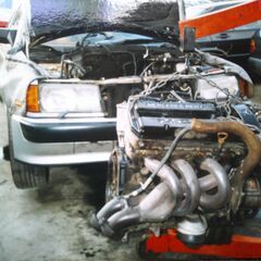 Mベンツ190E-23-16Vリビルトエンジン販売のせかえ実施中の画像