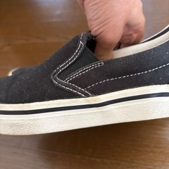 黒スリッポンの画像