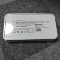 お菓子の缶(クーピー柄)の画像