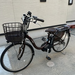 中古電動自転車（付属品付き）の画像