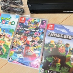 Nintendo Switch バッテリー強化版とソフト3つの画像