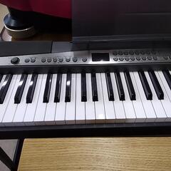 CASIOキーボード(取説・楽譜スタンド・ペダル付き)　85214　の画像