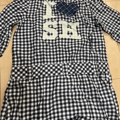 七分袖袖シャツ、裾広がりチュニックの画像