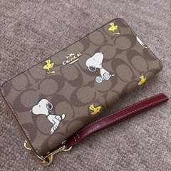 🌷お早めに🌷(8／29日.9時で出品最後)COACH  スヌーピー.長財布 の画像