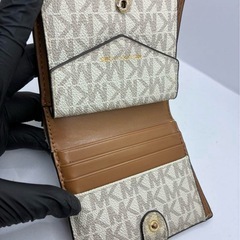 MICHAEL KORS マイケルコース 二つ折り財布 モノグラム柄の画像