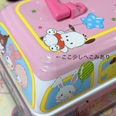 缶 サンリオ コロ付きの画像