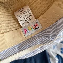 ベビー服とアクセサリーの画像