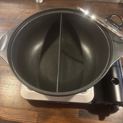 火鍋風鍋とカセットコンロの画像