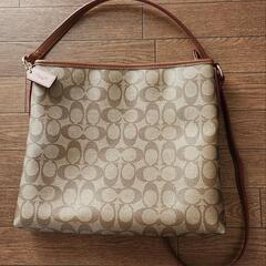 コーチCOACHシグネチャーショルダーバック　クロスボディブラウンの画像