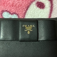 【早い者勝ち‼️】PRADA リボン付き 長財布 ※鑑定済み ブラック おしゃれ ファスナーの画像