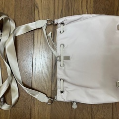 DISCOAT ベージュショルダーバッグの画像