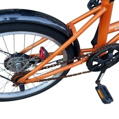 オレンジ色の折りたたみ自転車「FIELD CHAMP」の画像