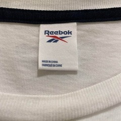 Reebok サングラス顔 Tシャツの画像