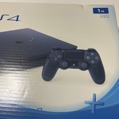 ps4 プレステ4 1TB コントローラーとカセット付きの画像
