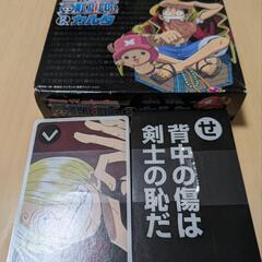 1分おんどく本、ONE PIECEカルタ、鉛筆の画像