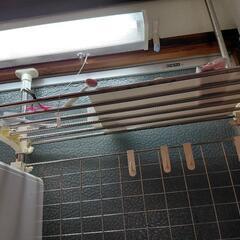 キッチン用の突っ張り棒収納・棚の画像
