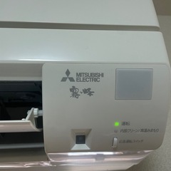 エアコン二台と不用品の画像