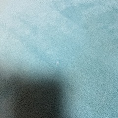 ブルーの丸いクッションの画像
