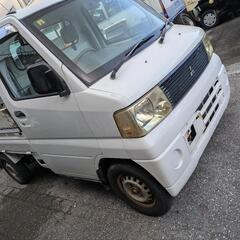 部品取り扱いミニキャブトラックの画像