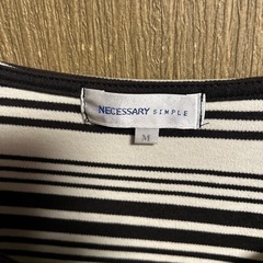 グレーと黒のカットソーM 美品の画像