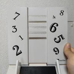 Bluetooth イヤホン / 本タブレット置きの画像