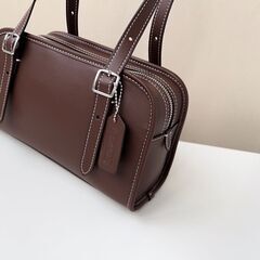 [コーチ] チョコレート色 swing zip コーディネート自在のハンドバッグ ショルダーバッグの画像