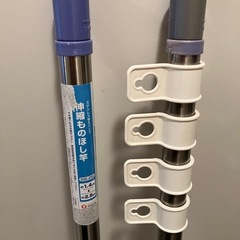 【お譲り】物干し竿2本 物干し竿立ての画像