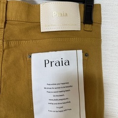 パンツ ズボン 黄色 オレンジ くすみカラーの画像