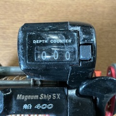 釣り好きの方に注目の商品🎣 カウンター付き両軸リール Magnum Ship SX 船 400 船釣り タコ釣り 石鯛釣り 汚れ・傷アリ💦 GEAR RATIO 5.1:1 黒 赤の画像