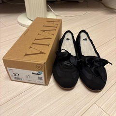 新品未使用23.5cmスニーカーの画像