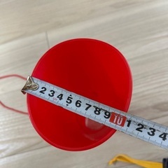 プラスチックメガホン　紐付き　赤色の画像